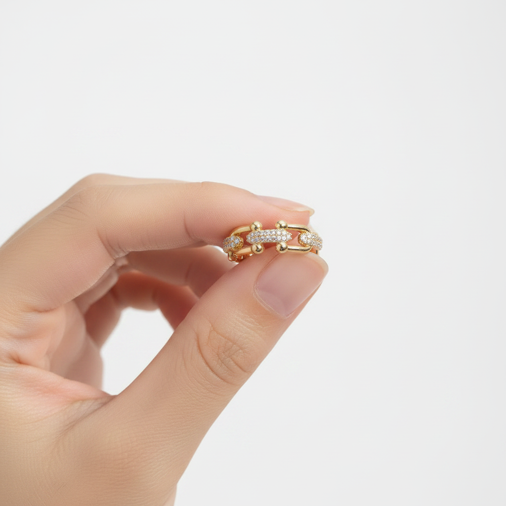 Ring Held Between Fingers